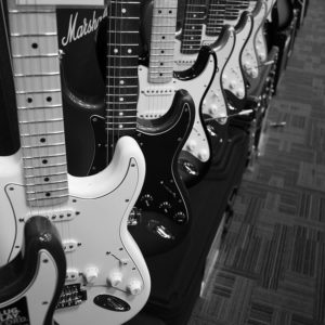 white and black guitar